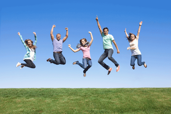 An image of a group of people jumping in the air to promote the homeopathic patches for energy balance from Frequency Apps.