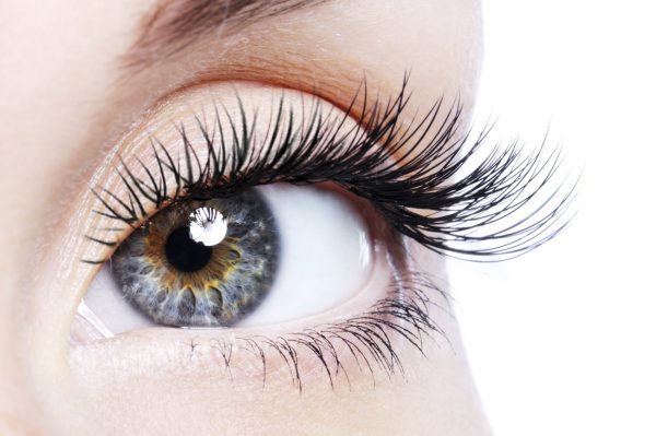 An up-close image of a woman’s eye to promote the homeopathic patches for eye and vision health from Frequency Apps.
