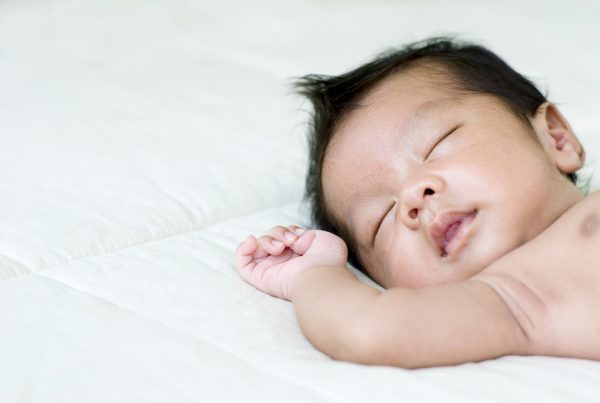 An image of a sleeping baby to promote the medicated patches for liver and gallbladder support from Frequency Apps.