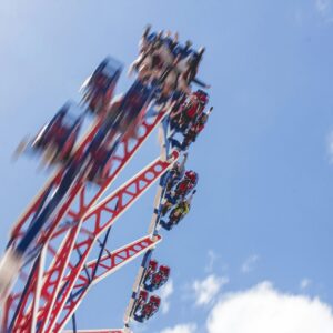 Spinning amusement park ride representing motion and the need for vertigo relief with Travel Aid patches